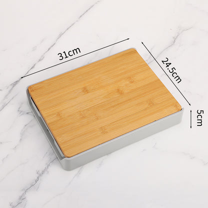 Bamboo cutting board with dimensions on a marble background