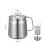 Stainless steel pot with lid and accessories on a white background